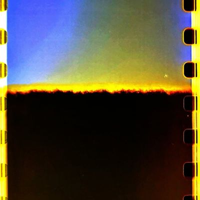 Abstract light leaks on a dark background